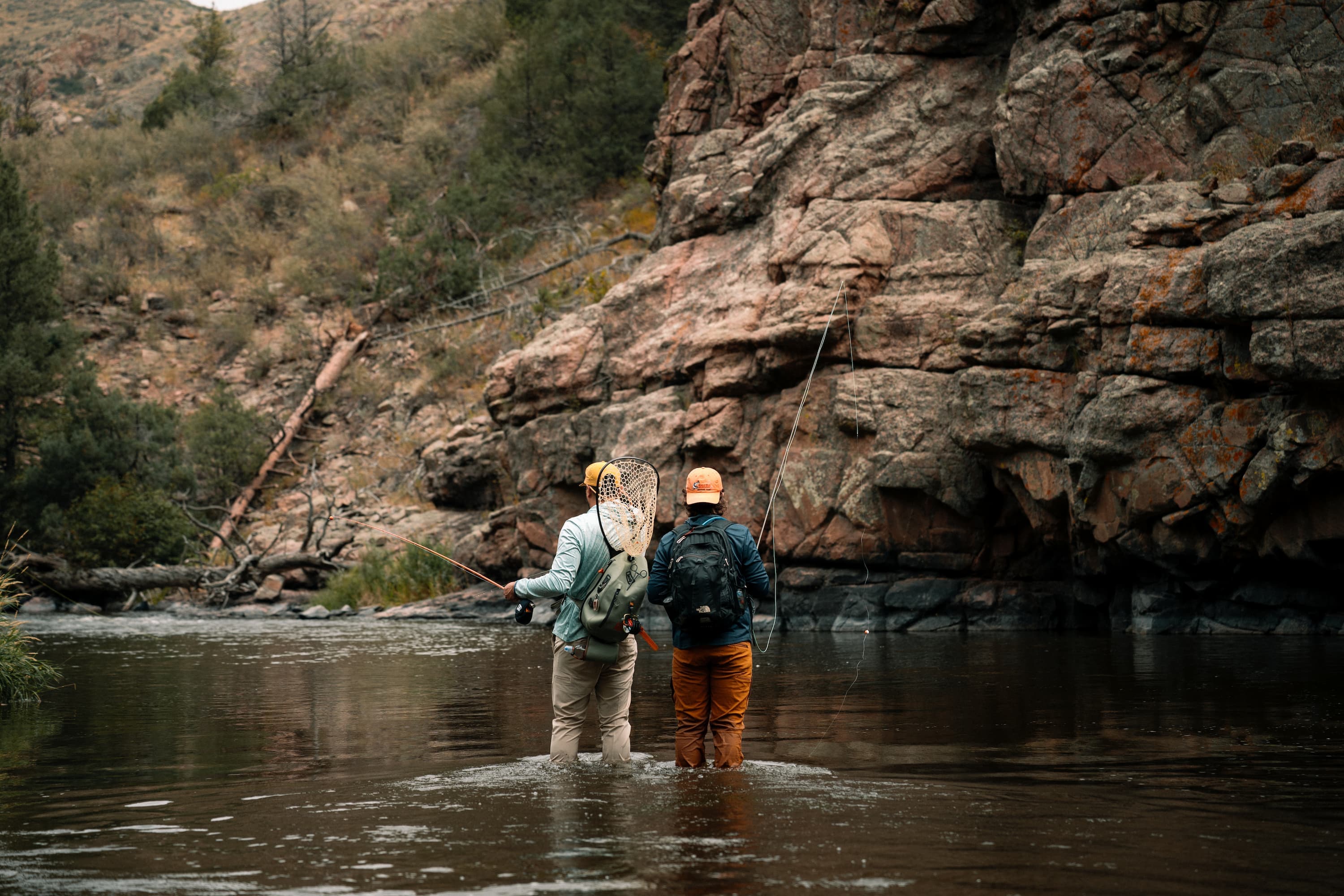 Two fishermen on the river